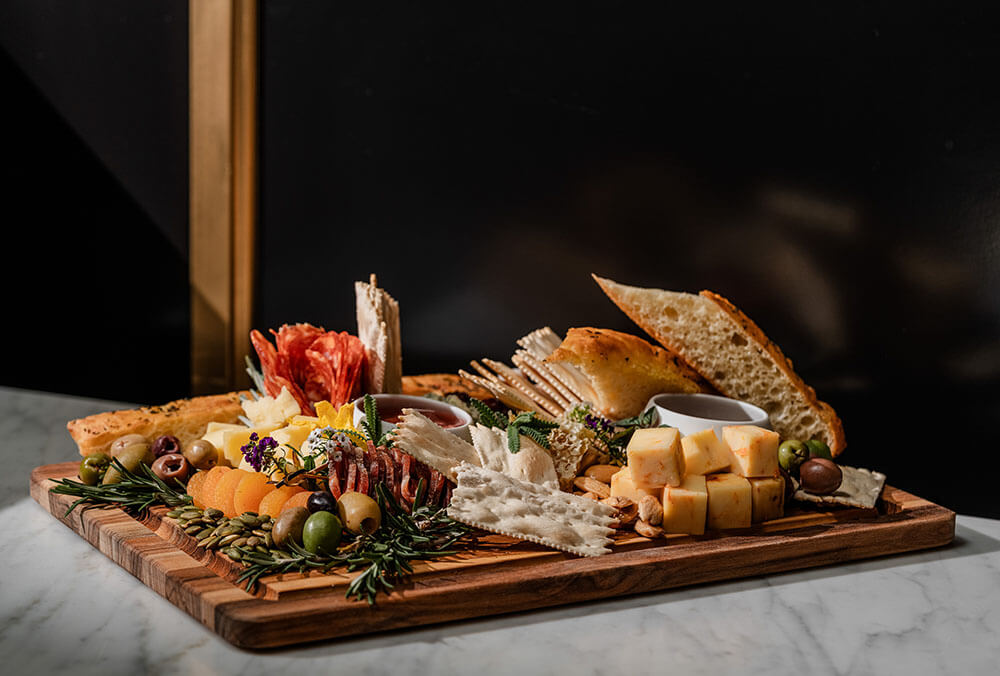 Michelin-inspired chocolate sphere with cake, ice cream, and salted caramel.
